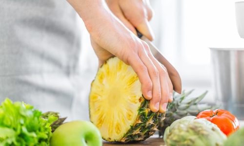 young-man-chef-cooking-healthy-food_1220-4308